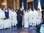 West Bengal governor Jagdeep Dhankar along with CM Mamata Banerjee pose for photographs with newly sworn-in ministers during a ceremony at Raj Bhavan, in Kolkata on May 10, 2021. (ANI Photo) West Bengal governor Jagdeep Dhankar along with CM Mamata Banerjee pose for photographs with newly sworn-in ministers during a ceremony at Raj Bhavan, in Kolkata on May 10, 2021. (ANI Photo)