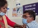 An elderly person being administered the Covid-19 vaccine at Sadar Hospital in Dhanbad in Jharkhand. 