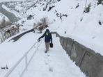 A villager walks in the snow covered terrain of the Himalayan ranges, after a fresh spell of snowfall at Keylong in Lahual-Spiti district, Wednesday, April 21, 2021.(PTI) A villager walks in the snow covered terrain of the Himalayan ranges, after a fresh spell of snowfall at Keylong in Lahual-Spiti district, Wednesday, April 21, 2021.(PTI)
