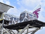 A Qatar Airways flight carrying another 1350 oxygen cylinders sent by British Oxygen Company from the UK, arrives in India to fight Covid-19. (PTI Photo) A Qatar Airways flight carrying another 1350 oxygen cylinders sent by British Oxygen Company from the UK, arrives in India to fight Covid-19. (PTI Photo)