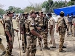 Security personnel at a polling station after the Election Commission stopped voting exercise at a polling station in Sitalkuchi, after violence on April 10. Security personnel at a polling station after the Election Commission stopped voting exercise at a polling station in Sitalkuchi, after violence on April 10.