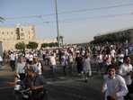 Israelis run to shelters as air attack sirens goes off during a Jerusalem Day march, in Jerusalem.(AP) Israelis run to shelters as air attack sirens goes off during a Jerusalem Day march, in Jerusalem.(AP)