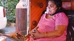 A Covid-19 patient breathes with oxygen support during a community service drive by Gurdwara Damdama Sahib in New Delhi on May 6. Delhi recorded 13,336 new Covid-19 cases on May 9, the fewest in a day since April 12, as the test positivity rate also continued its steady drop, falling to 21.67%, the lowest since April 16. A Covid-19 patient breathes with oxygen support during a community service drive by Gurdwara Damdama Sahib in New Delhi on May 6. Delhi recorded 13,336 new Covid-19 cases on May 9, the fewest in a day since April 12, as the test positivity rate also continued its steady drop, falling to 21.67%, the lowest since April 16.