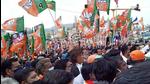 Tamil Nadu, March 31 (ANI): BJP supporters carry party flag during the roadshow of Defence Minister Rajnath Singh in Udhagmandalam ahead of the assembly elections, on Wednesday. (ANI Photo) (ANI) Tamil Nadu, March 31 (ANI): BJP supporters carry party flag during the roadshow of Defence Minister Rajnath Singh in Udhagmandalam ahead of the assembly elections, on Wednesday. (ANI Photo) (ANI)