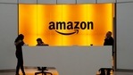 People stand in the lobby for Amazon offices in New York. Amazon, which has been under pressure from shoppers, brands and lawmakers to crack down on counterfeits on its site said that it blocked more than 10 billion suspected phony listings last year before any of their offerings could be sold. (AP) People stand in the lobby for Amazon offices in New York. Amazon, which has been under pressure from shoppers, brands and lawmakers to crack down on counterfeits on its site said that it blocked more than 10 billion suspected phony listings last year before any of their offerings could be sold. (AP)