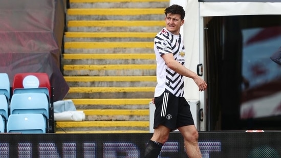 Manchester United's Harry Maguire leaves the pitch after sustaining an injury(Pool via REUTERS)