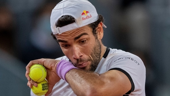 Italy's Matteo Berrettini in action against Germany's Alexander Zverev during the men's final match at the Madrid Open.(AP)