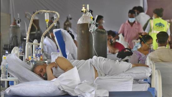 Gurugram, India - May 7, 2021: A view inside the "Oxygen Centre" being run by Hemkunt Foundation at Sector 56 for Covid-19 patients, in Gurugram, India, on Friday, May 7, 2021. (Photo by Vipin Kumar / Hindustan Times) (Vipin Kumar /HT PHOTO) Gurugram, India - May 7, 2021: A view inside the "Oxygen Centre" being run by Hemkunt Foundation at Sector 56 for Covid-19 patients, in Gurugram, India, on Friday, May 7, 2021. (Photo by Vipin Kumar / Hindustan Times) (Vipin Kumar /HT PHOTO)