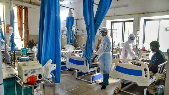 Medics check on patients at a Covid-19 care hospital. (File Photo / Representational Image)