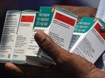 A man holds boxes of Remdesivir, an antiviral drug used to treat Covid-19 symptoms. (PTI) A man holds boxes of Remdesivir, an antiviral drug used to treat Covid-19 symptoms. (PTI)
