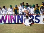Pakistan cricket team pose with the trophy after winning the series. Pakistan cricket team pose with the trophy after winning the series.