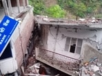 Officials present at the spot said extensive damage was caused to municipality buildings.(HT Photo) Officials present at the spot said extensive damage was caused to municipality buildings.(HT Photo)