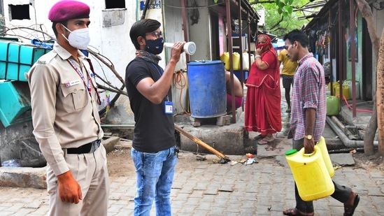 Civil Defence volunteers calling out to residents to get inoculated against Covid-19 at Anand Parbat in New Delhi on May 10. “We must prepare for the third wave. In this wave (second for the country and fourth for the city), Delhi recorded a maximum of 28,000 cases in a day. The whole infrastructure was under pressure after this. The scale at which we are creating infrastructure, we will be able to deal even if 30,000 daily cases are reported in next wave,” Kejriwal told reporters on May 10.(Raj K Raj / HT Photo)