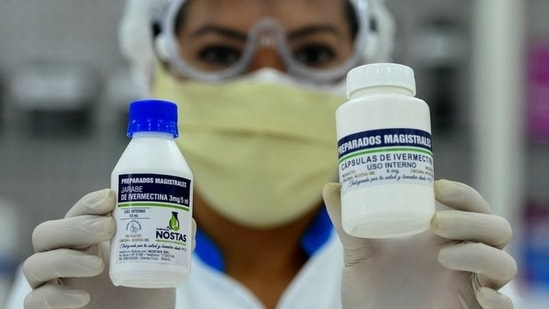 A pharmacist holds the anti-parasite drug Ivermectin. The drug has been found to have "weak evidence" in favour of its benefits in coronavirus disease (Covid-19) treatment. (File Photo / REUTERS)