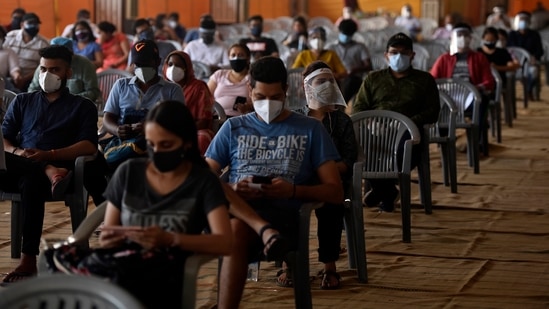 People waiting to be inoculated against Covid-19 at a vaccination centre at Radha Soami Satsang grounds being run by BLK-Max hospital, in New Delhi, India, on Thursday, May 6, 2021. (Photo by Sanjeev Verma/ Hindustan Times) People waiting to be inoculated against Covid-19 at a vaccination centre at Radha Soami Satsang grounds being run by BLK-Max hospital, in New Delhi, India, on Thursday, May 6, 2021. (Photo by Sanjeev Verma/ Hindustan Times)