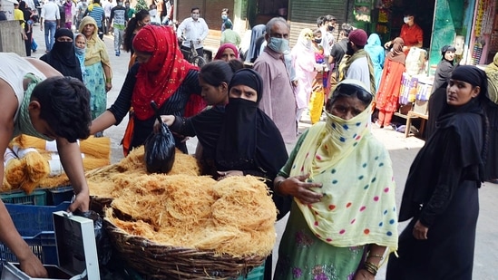 Women purchase Sewaiyan ahead of Eid festival during the lockdown, at a market in Mathura on Tuesday. (Representational image)(ANI)