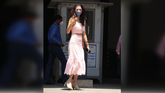 She teamed it with a midi skirt that had a zig zag hem while flaunting her enviable curves.  (Varinder Chawla)