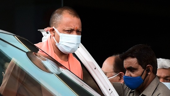 UP chief minister Yogi Adityanath arrives at the SRN Hospital to inspect the special Covid-19 coronavirus ward in Allahabad on April 9, 2021. (AFP)