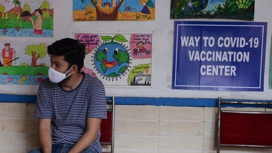 A man waits to get a dose of the Covishiled Covid-19 coronavirus vaccine at a school used as a vaccination centre in New Delhi on May 11, 2021. (AFP) A man waits to get a dose of the Covishiled Covid-19 coronavirus vaccine at a school used as a vaccination centre in New Delhi on May 11, 2021. (AFP)