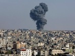 Smoke rises after an Israeli airstrike in Gaza City, the Gaza Strip, Wednesday, May 12, 2021. Smoke rises after an Israeli airstrike in Gaza City, the Gaza Strip, Wednesday, May 12, 2021.