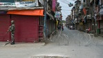 A CRPF personnel stands guard during lockdown imposed in Jammu and Kashmir by administration to contain the surge in Covid-19 cases, in Srinagar.(PTI) A CRPF personnel stands guard during lockdown imposed in Jammu and Kashmir by administration to contain the surge in Covid-19 cases, in Srinagar.(PTI)
