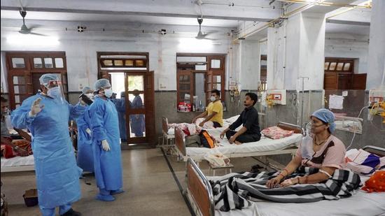 Doctors attend to patients in KanpurMay 8, 2021. The process of medical management of Covid-19 is under great strain. Testing is hard, hospital admissions of patients with serious symptoms (with or without a test) are harder, there is an acute shortage of medical supplies, contact-tracing is non-existent, bureaucratic red tape has made care even more difficult, and there is little dignity in death. (PTI)