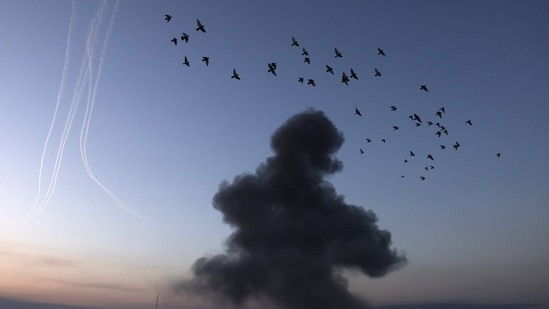 Smoke rises after an Israeli air strike in Gaza City near Barcelona Park on May 12. "The children have escaped the coronavirus, and now a new trauma," one Israeli woman in the coastal city of Ashkelon said on Channel 11 television, Reuters reported.(Mohammed Abed / AFP)