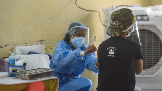 A person being vaccinated against Covid-19 at Janakpuri in New Delhi on Tuesday, May 11. (Amal KS/HT photo) A person being vaccinated against Covid-19 at Janakpuri in New Delhi on Tuesday, May 11. (Amal KS/HT photo)