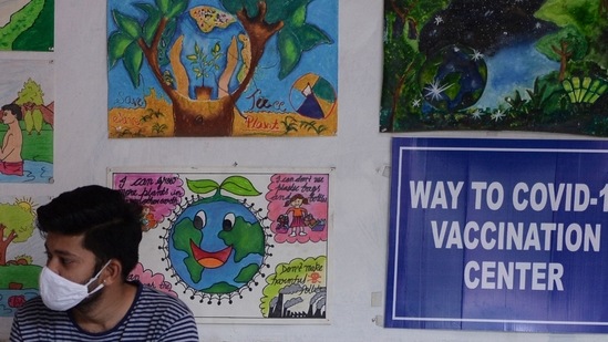 A man waits to get a dose of the Covishiled Covid-19 coronavirus vaccine at a school used as a vaccination centre in New Delhi on May 11, 2021. A man waits to get a dose of the Covishiled Covid-19 coronavirus vaccine at a school used as a vaccination centre in New Delhi on May 11, 2021.