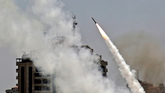Israelis ran for shelters or flattened themselves on pavements in communities more than 70 km (45 miles) up the coast and into southern Israel amid sounds of explosions as interceptor missiles streaked into the sky. (AFP) Israelis ran for shelters or flattened themselves on pavements in communities more than 70 km (45 miles) up the coast and into southern Israel amid sounds of explosions as interceptor missiles streaked into the sky. (AFP)