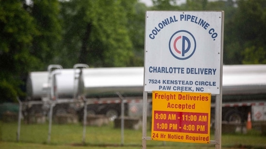 Tanker trucks can be seen in an adjacent lot next to the entrance of the Colonial Pipeline tank farm in Charlotte, North Carolina. (AFP) Tanker trucks can be seen in an adjacent lot next to the entrance of the Colonial Pipeline tank farm in Charlotte, North Carolina. (AFP)