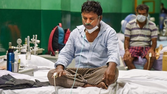A Covid-19 patient undergoes treatment at a Covid Care Centre, as coronavirus cases surge in Bengaluru, (PTI) A Covid-19 patient undergoes treatment at a Covid Care Centre, as coronavirus cases surge in Bengaluru, (PTI)