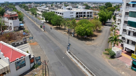 A street in Maharashtra's Amravati wears a deserted look during complete lockdown imposed by authorities amid a surge in Covid-19 cases.(PTI Photo)