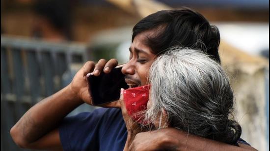 Family members mourn the death of a Covid-19 victim at Patna Medical College and Hospital, in Patna on Wednesday, May 12. (ANI)