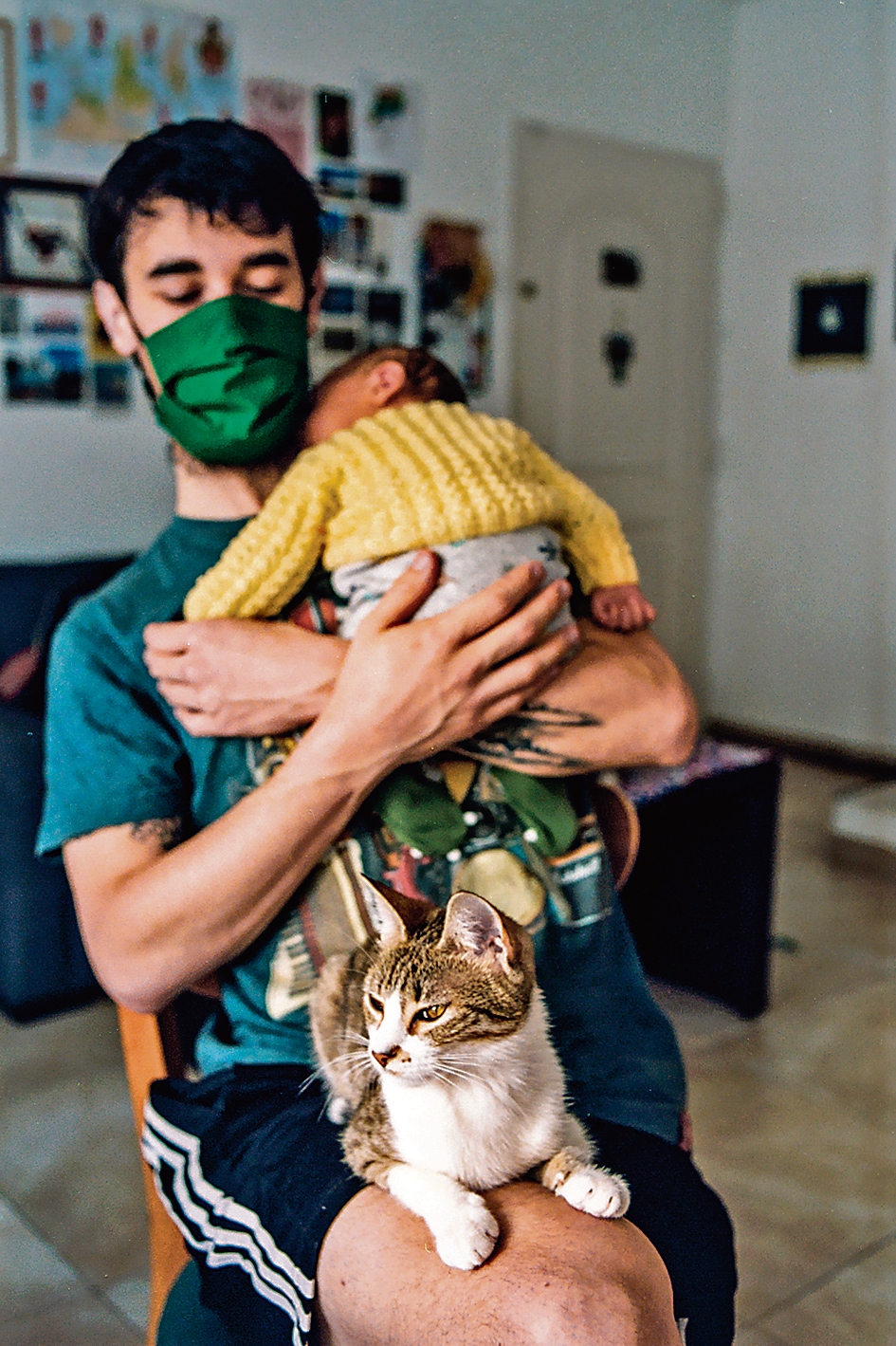 Analia Cid’s picture shows her partner, their cat and his newborn nephew and godson. (Analia Cid) Analia Cid’s picture shows her partner, their cat and his newborn nephew and godson. (Analia Cid)