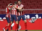 Atletico Madrid players celebrate a goal. Atletico Madrid players celebrate a goal.