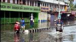 People wade through a waterlogged Chalai market following heavy rain in Thiruvananthapuram. (ANI PHOTO.) People wade through a waterlogged Chalai market following heavy rain in Thiruvananthapuram. (ANI PHOTO.)