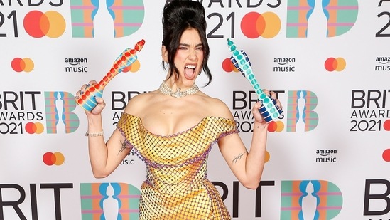Singer Dua Lipa poses with her awards at the BRIT Awards at the O2 Arena in London, Britain May 11, 2021.  (via REUTERS)