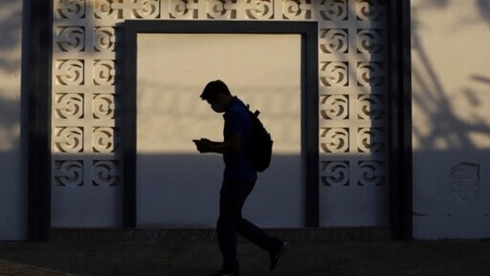 A Health Ministry worker enters a government facility where Covid-19 vaccines are stored.(AP) A Health Ministry worker enters a government facility where Covid-19 vaccines are stored.(AP)