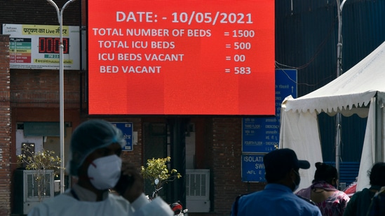 A digital display board notifies occupancy of beds at Lok Nayak Jai Prakash (LNJP) hospital, in New Delhi, India, on May 10. “The rush of patients in need of admissions has reduced over the past two or three days. Earlier, we were getting 150 to 170 patients each day; that has gone down to about 80 to 100 daily,” a doctor from the Delhi government-run Lok Nayak hospital told HT on condition of anonymity.(Sanjeev Verma / HT Photo)