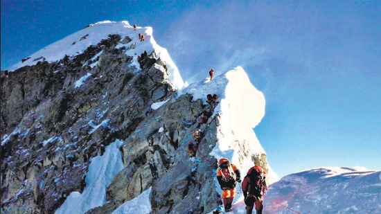 Jitendra Gaware and sherpa Pasang Zarok on the last ridge before the Mount Everest summit, which they reached on May 12. (HT) Jitendra Gaware and sherpa Pasang Zarok on the last ridge before the Mount Everest summit, which they reached on May 12. (HT)
