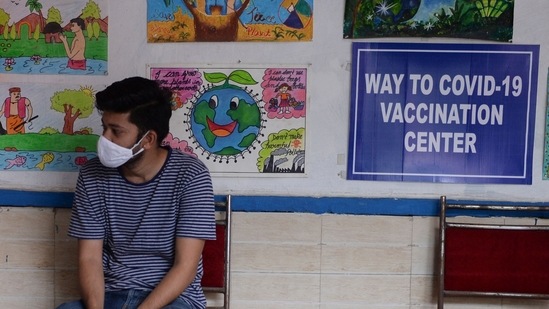 A man waits to get a dose of the Covishiled Covid-19 coronavirus vaccine at a school used as a vaccination centre in New Delhi. (AFP) A man waits to get a dose of the Covishiled Covid-19 coronavirus vaccine at a school used as a vaccination centre in New Delhi. (AFP)