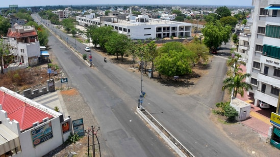 A street in Maharashtra's Amravati wears a deserted look during complete lockdown imposed by authorities amid a surge in Covid-19 cases.(PTI Photo)