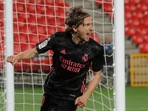 Real Madrid's Luka Modric celebrates scoring their first goal.