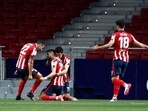 Atletico Madrid's Yannick Carrasco celebrates scoring a goal with teammates(REUTERS)