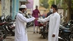 Men greet each other after offering prayers during Eid-al-Fitr festival, which marks the end of Islamic holy fasting month of Ramzan, outside their home during a Covid-19 induced lockdown, in Hyderabad on May 14. Amid a surge in Covid-19 cases, people in most parts of India offered namaz at their homes. Men greet each other after offering prayers during Eid-al-Fitr festival, which marks the end of Islamic holy fasting month of Ramzan, outside their home during a Covid-19 induced lockdown, in Hyderabad on May 14. Amid a surge in Covid-19 cases, people in most parts of India offered namaz at their homes.