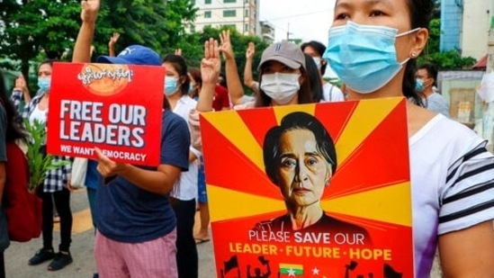Anti-coup protesters march along a street in Yangon, Myanmar.(AP File Photo ) Anti-coup protesters march along a street in Yangon, Myanmar.(AP File Photo )