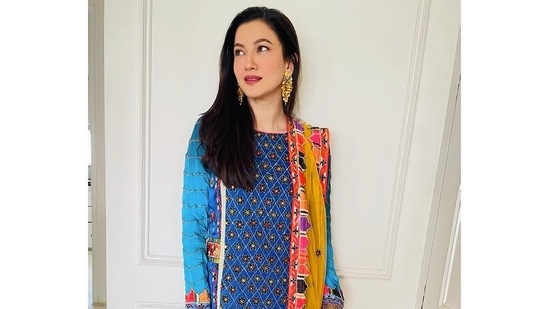Gauahar Khan took to her Instagram feed and shared with her fans her stunning multicoloured ensemble for Eid. Gauahar opted for a stunning blue kurta with embroidery and applique work.(Instagram)