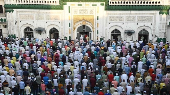 A large number of devotees gather to offer prayers on the occasion of Eid-al-Fitr festival, at Jama Masjid Khairuddin, in Amritsar on May 14. "We have followed all the Covid-19 guidelines while offering the namaz. Only nearby people came to offer namaz at the Jama masjid. We prayed for all the people who are suffering from Covid-19," Mohammad Danish told ANI.(Narinder Nanu / AFP)