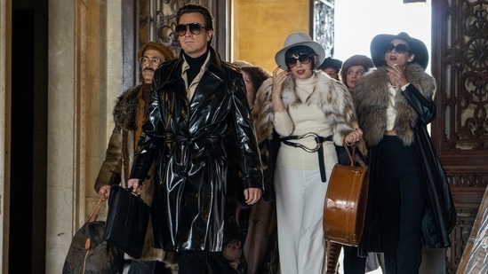This image released by Netflix shows David Pittu as Joe Eula, from left, Ewan McGregor as Halston, Krysta Rodriguez as Liza Minnelli and Rebecca Dayan as Elsa Peretti in a scene from "Halston." A new series about the fashion designer premieres Friday on Netflix. (AP) This image released by Netflix shows David Pittu as Joe Eula, from left, Ewan McGregor as Halston, Krysta Rodriguez as Liza Minnelli and Rebecca Dayan as Elsa Peretti in a scene from "Halston." A new series about the fashion designer premieres Friday on Netflix. (AP)